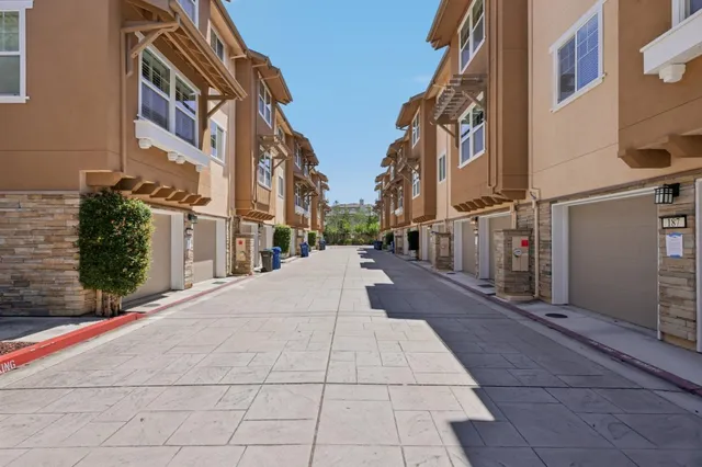 a city street lined with tall buildings