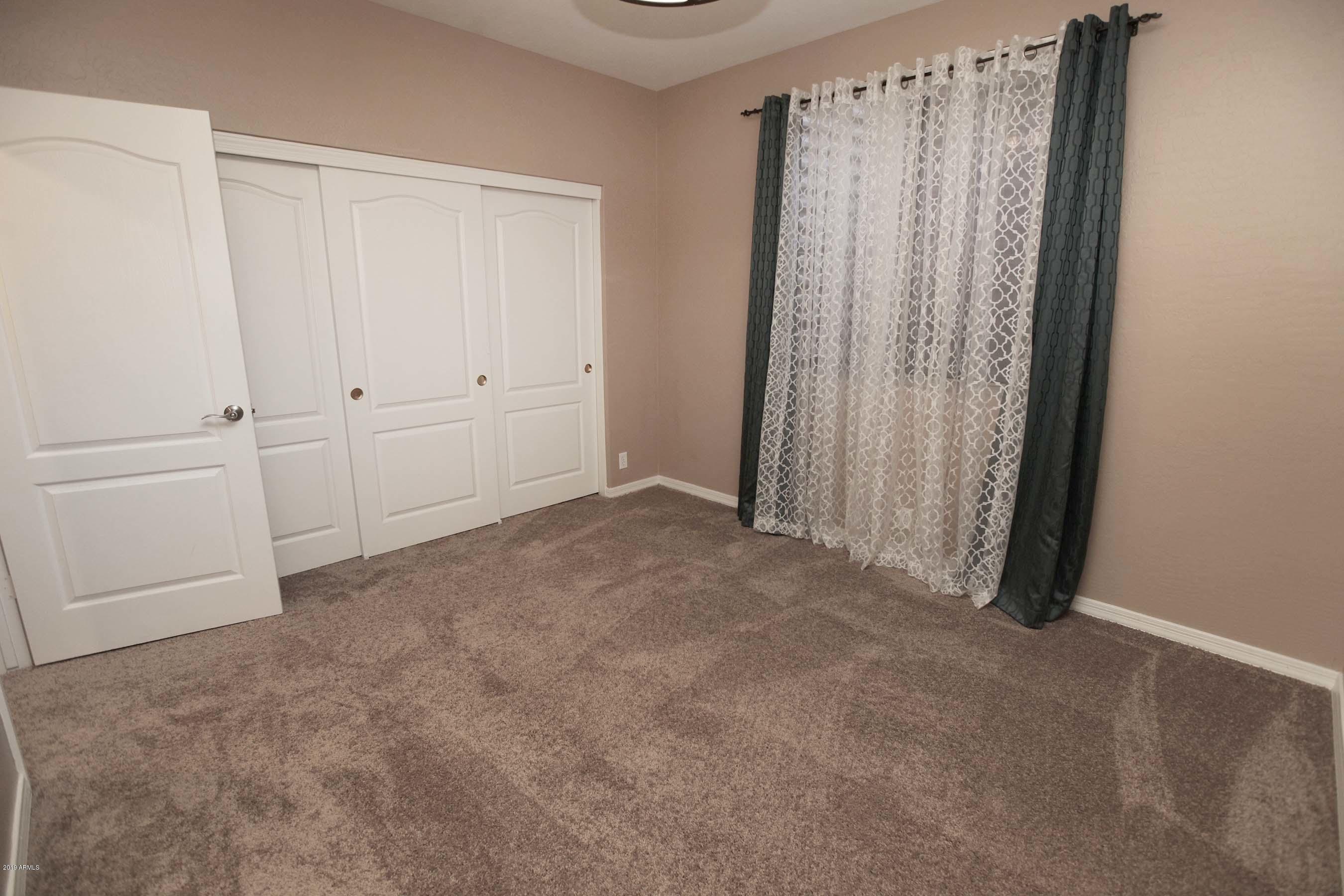 1545 North Rico Circle Mesa, AZ 85213 - Photo 29 of 51 Downstairs secondary bedroom