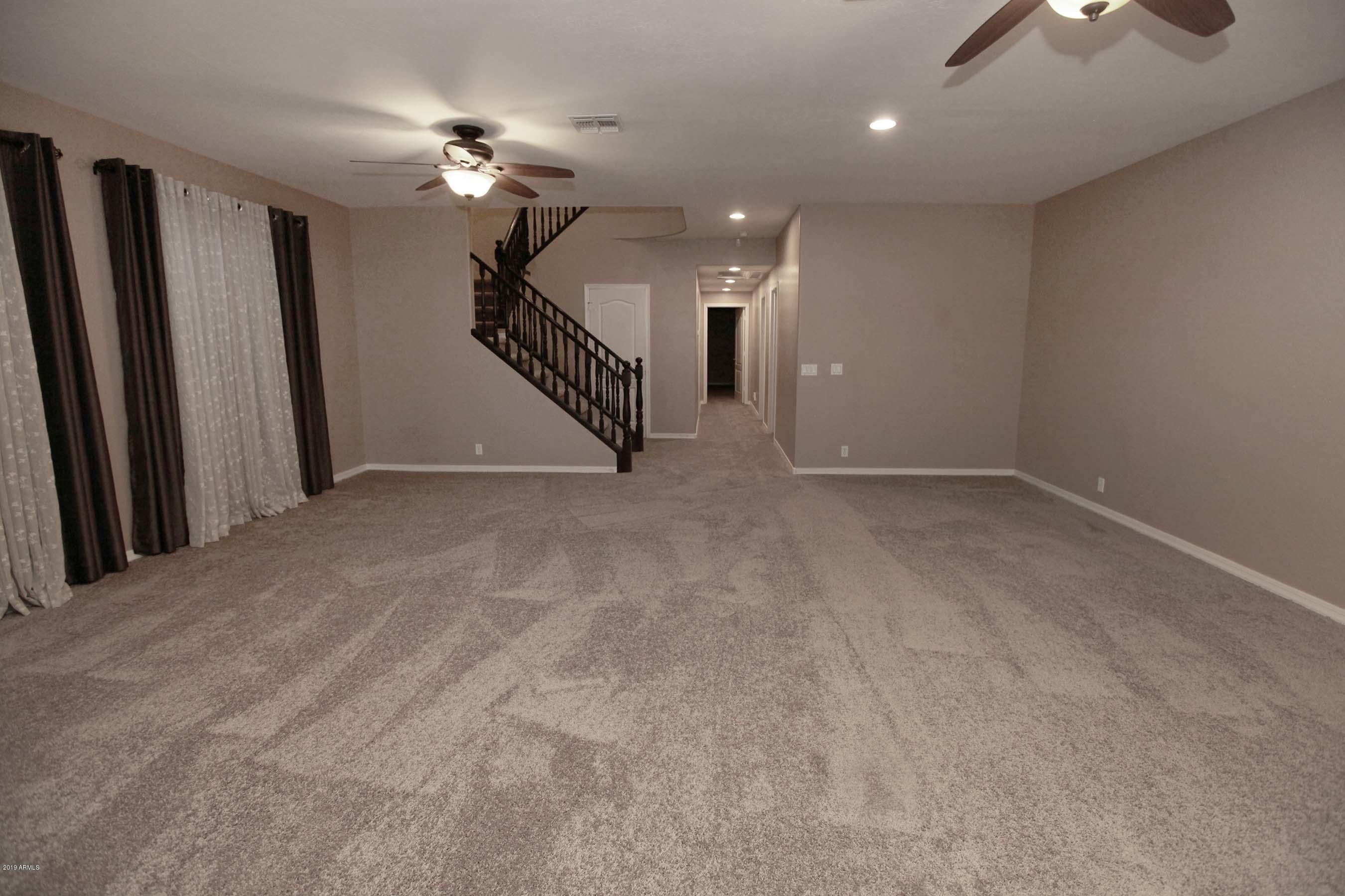1545 North Rico Circle Mesa, AZ 85213 - Photo 32 of 51 Basement Fun Room