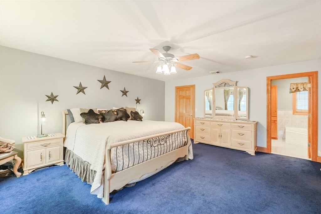 11 Brigham Road Paxton, MA 01612 - Photo 22 of 42 a bedroom with a white bed and white walls