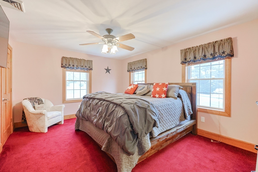 11 Brigham Road Paxton, MA 01612 - Photo 27 of 42 a spacious bedroom with a bed and a window