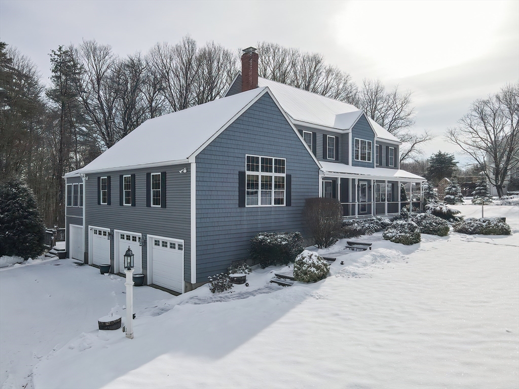 11 Brigham Road Paxton, MA 01612 - Photo 3 of 42 a view of a house with a yard covered in snow
