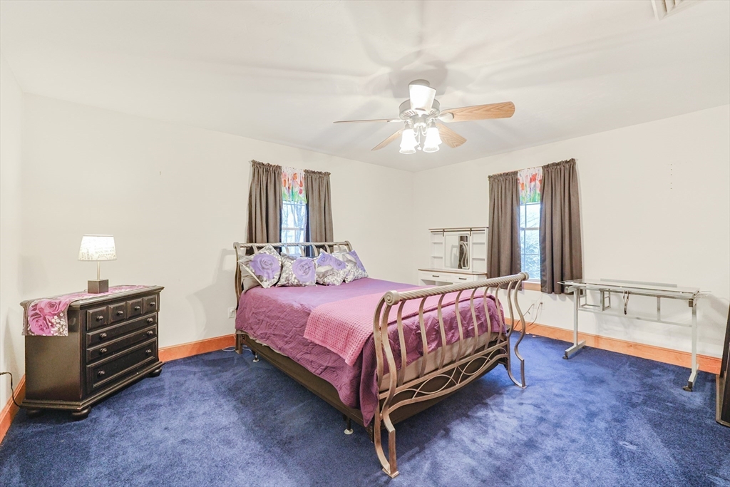 11 Brigham Road Paxton, MA 01612 - Photo 31 of 42 a bedroom with a bed dresser and a window