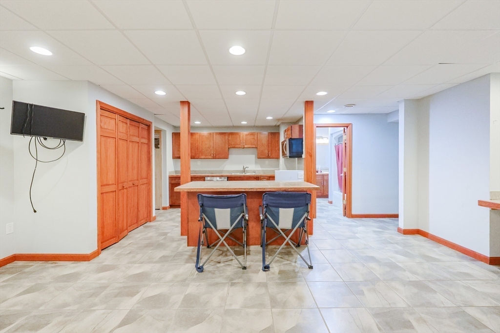 11 Brigham Road Paxton, MA 01612 - Photo 34 of 42 a kitchen with a table and chairs in it