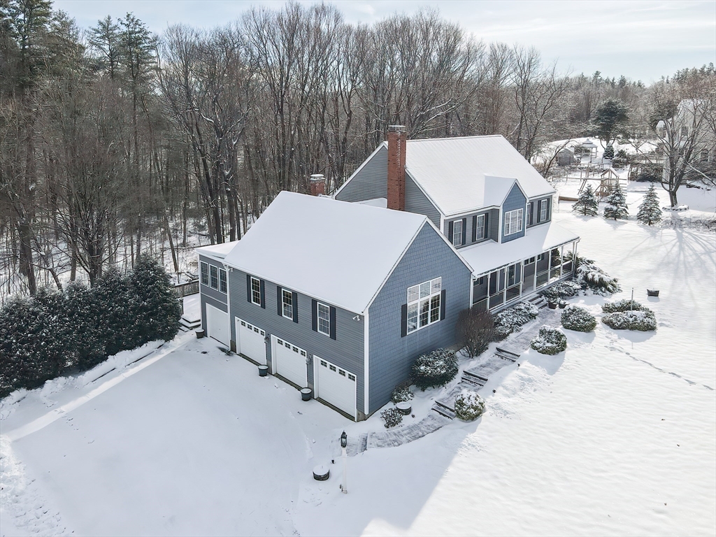 11 Brigham Road Paxton, MA 01612 - Photo 37 of 42 a view of a house with a yard covered in snow