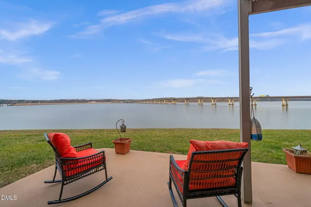 a view of a ocean with outdoor seating