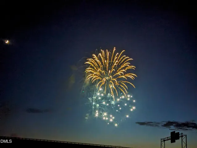 a sign board with a play house