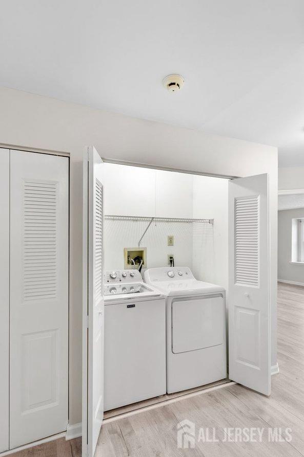 724 Edpas Road New Brunswick, NJ 08901 - Photo 13 of 24 a view of cabinets with white wooden cabinets