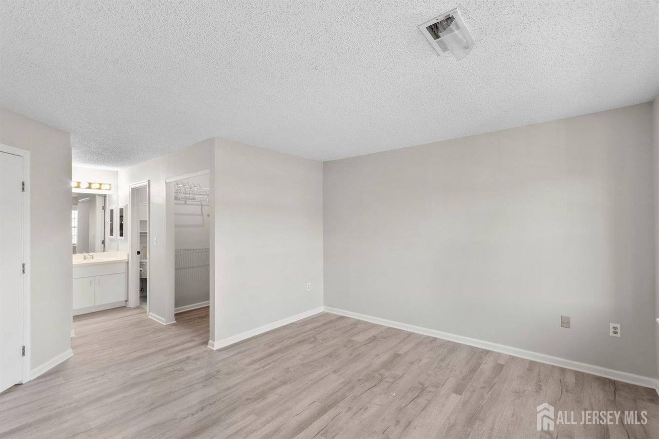 724 Edpas Road New Brunswick, NJ 08901 - Photo 18 of 24 a view of an empty room and wooden floor