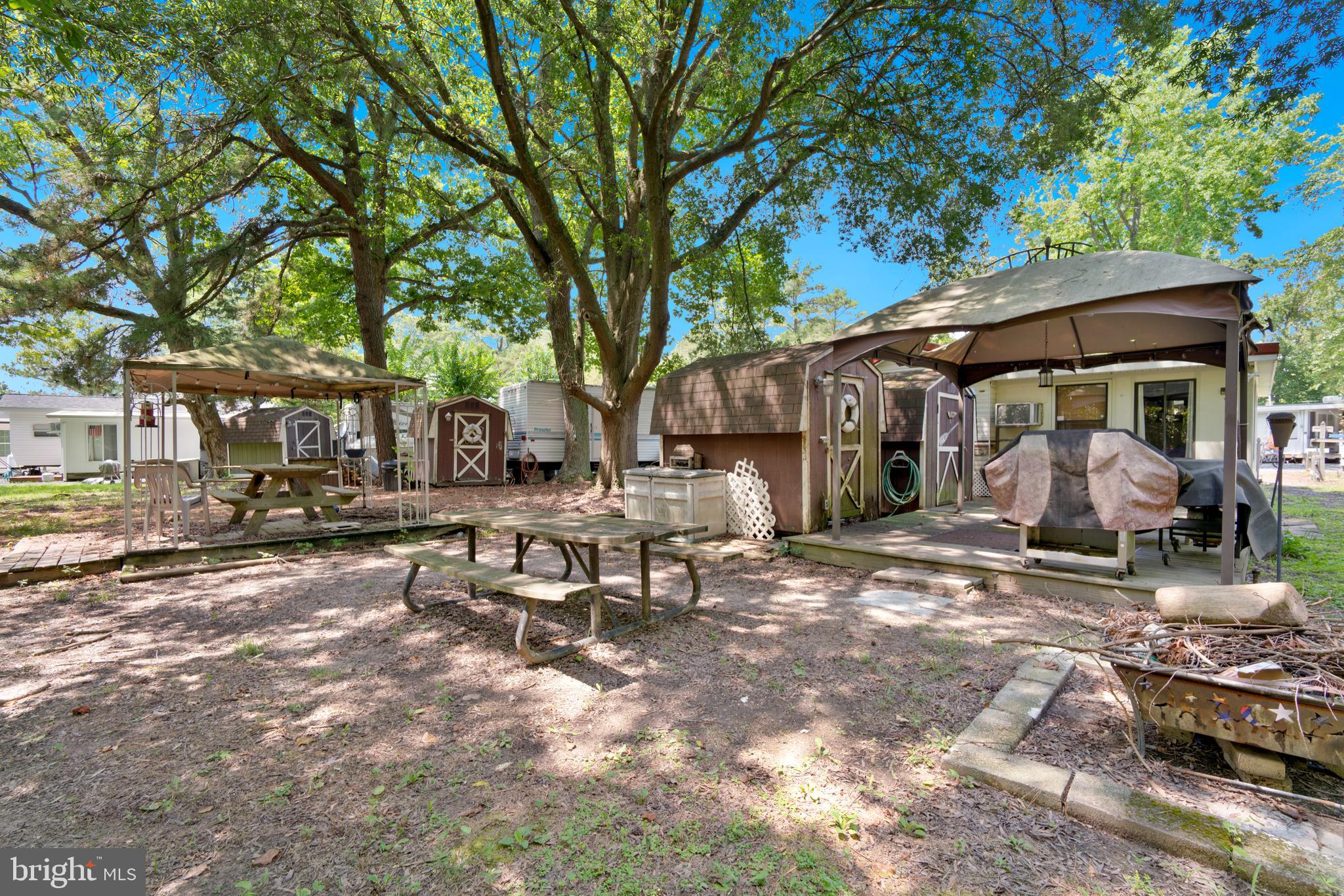 111 Beach Harbor Road, Unit 11F Grasonville, MD 21638 - Photo 11 of 13 a view of a outdoor space with sitting area