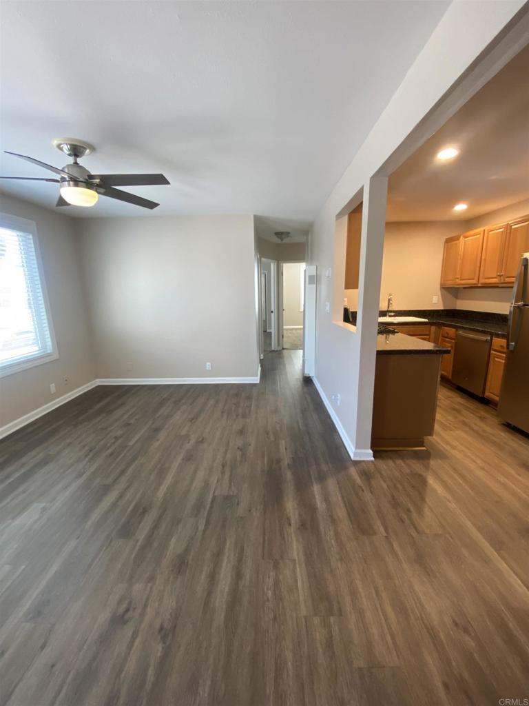 2088 Montgomery Avenue, Unit M Cardiff-by-the-Sea, CA 92007 - Photo 29 of 43 wooden floor in an empty room with a window