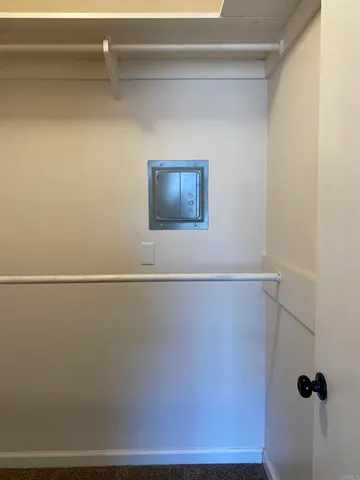 a bathroom with a granite countertop sink and shower
