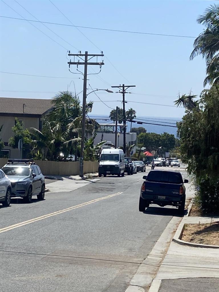 2088 Montgomery Avenue, Unit M Cardiff-by-the-Sea, CA 92007 - Photo 4 of 43 a car parked on the side of a street