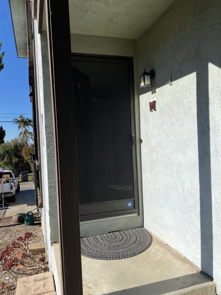 2088 Montgomery Avenue, Unit M Cardiff-by-the-Sea, CA 92007 - Photo 7 of 43 a view of a hallway with a door