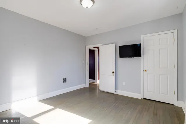 a view of a room with a large window