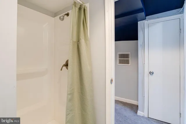 a view of a balcony with wooden floor