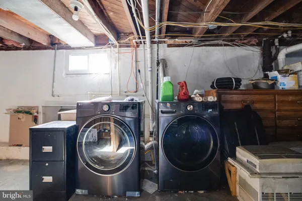 a view of a chairs and table in patio