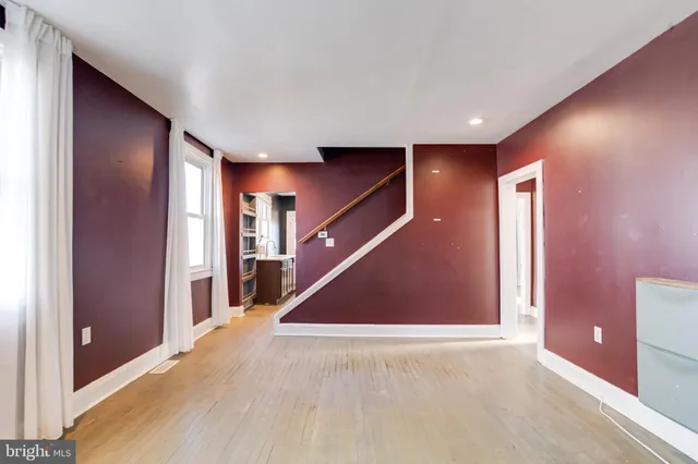 a view of a hallway with staircase