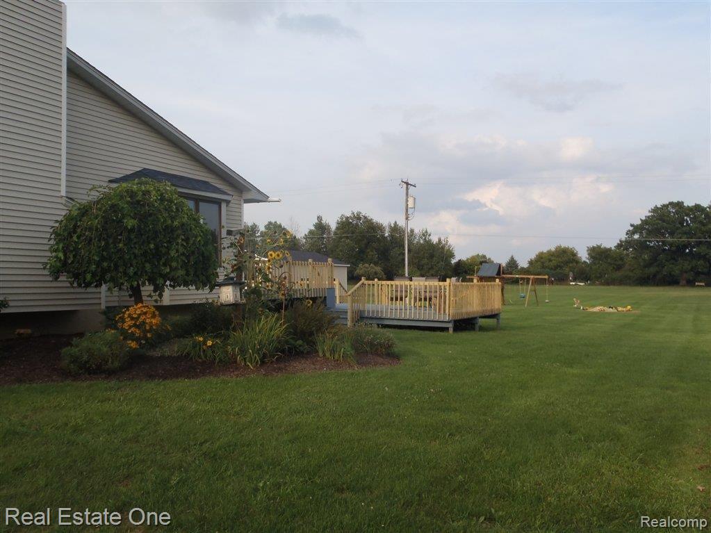 3423 Wynns Mill Road Metamora, MI 48455 - Photo 2 of 17 Back Deck and Property.JPG