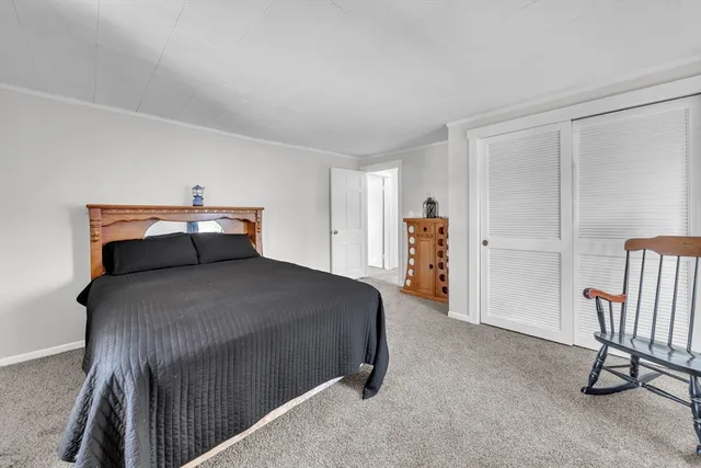 a view of an empty room with an entryway