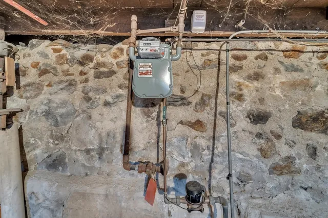 a view of a house with wooden deck