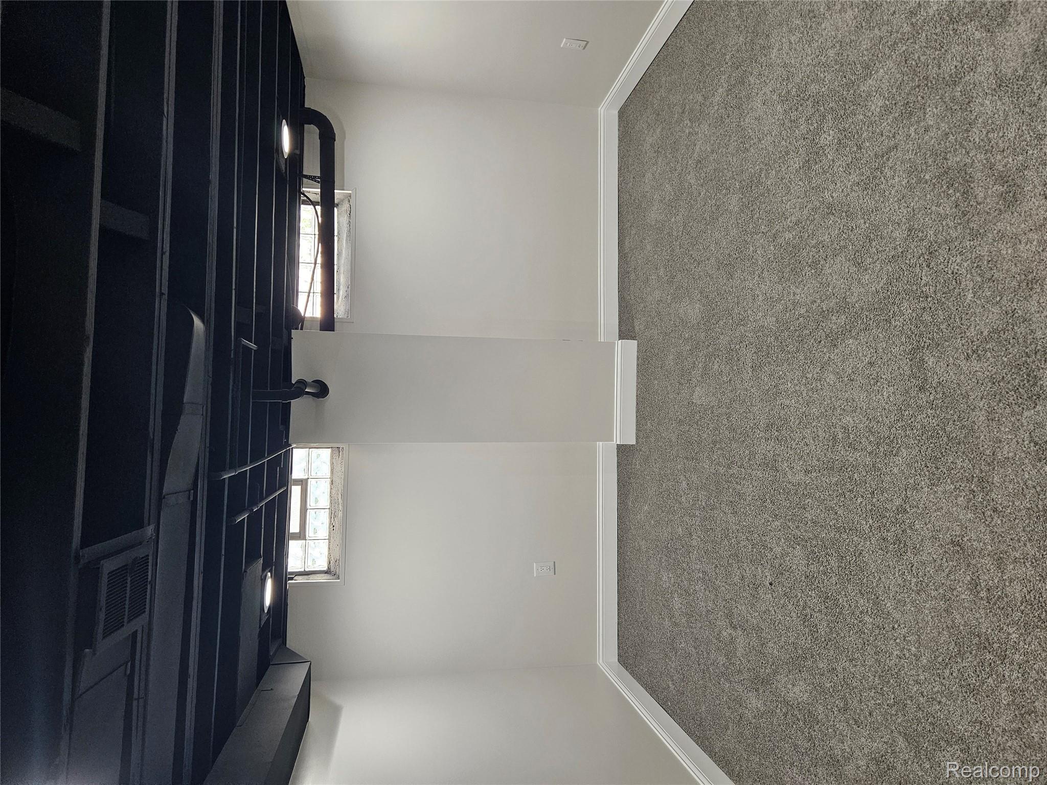 17345 Annchester Road Detroit, MI 48219 - Photo 21 of 22 Basement with baseboards and light colored carpet