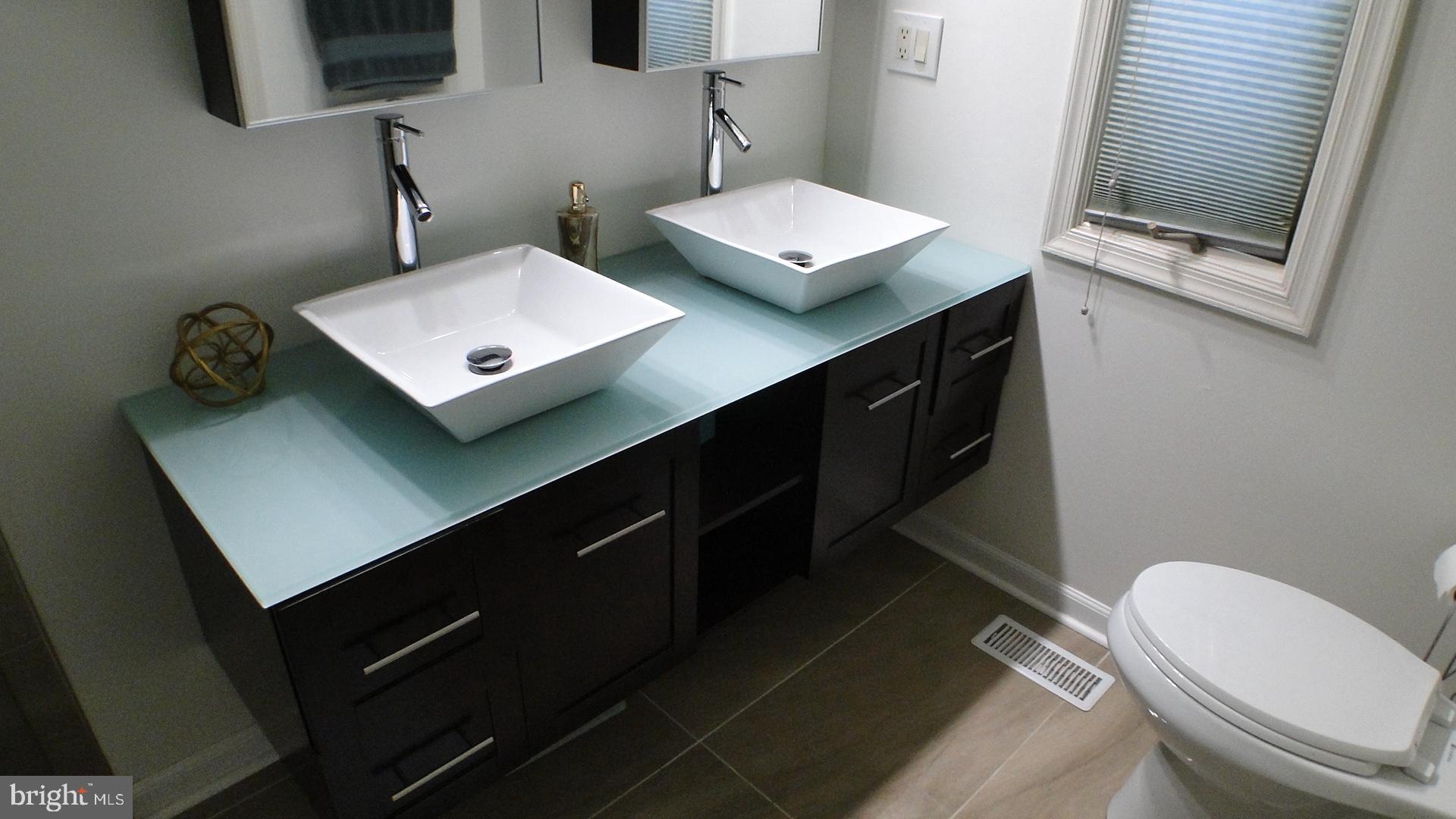 5175 Columbia Road, Unit 1143 Columbia, MD 21044 - Photo 21 of 48 Primary Bathroom double vanity and basin sinks