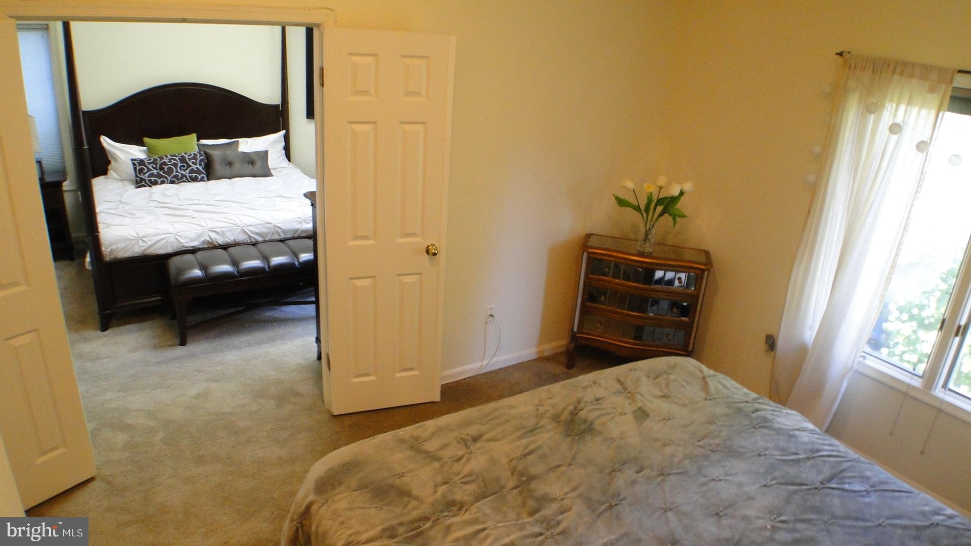5175 Columbia Road, Unit 1143 Columbia, MD 21044 - Photo 25 of 48 Second Bedroom with doors into Master