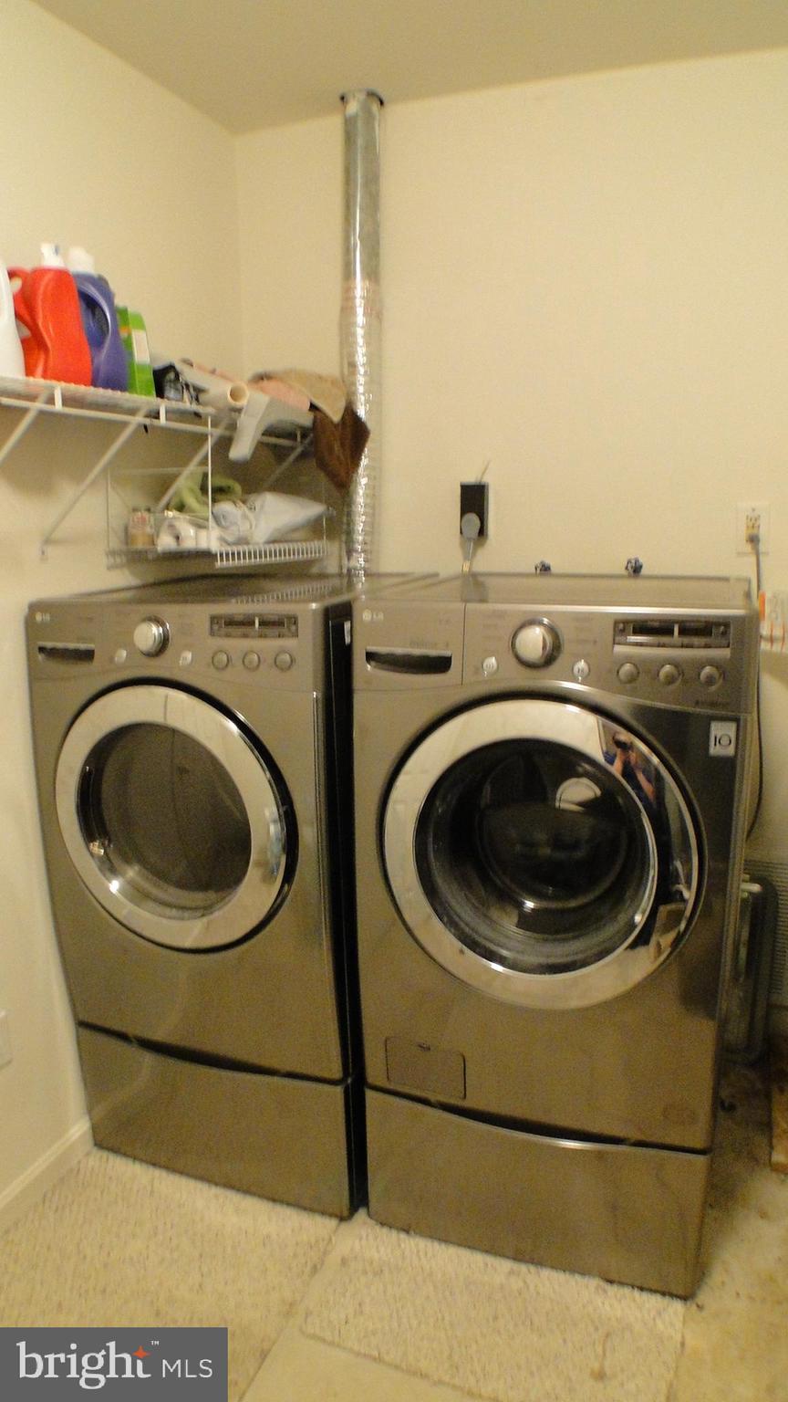 5175 Columbia Road, Unit 1143 Columbia, MD 21044 - Photo 42 of 48 Basement Front Loader Stainless Laundry Machines