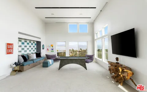 a view of a patio on the roof deck