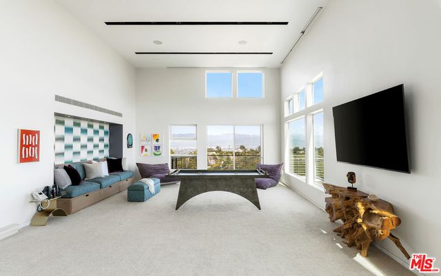 a view of a patio on the roof deck