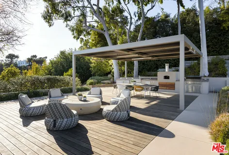 a view of balcony with furniture