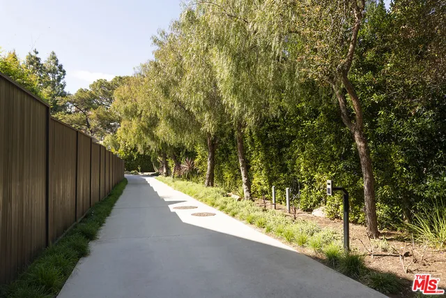 a living room with fireplace furniture and a flat screen tv