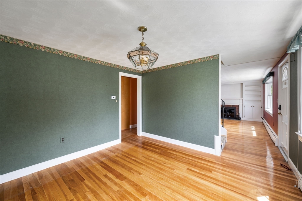 40 Bell Road Weymouth, MA 02188 - Photo 26 of 41 a view of empty room with wooden floor