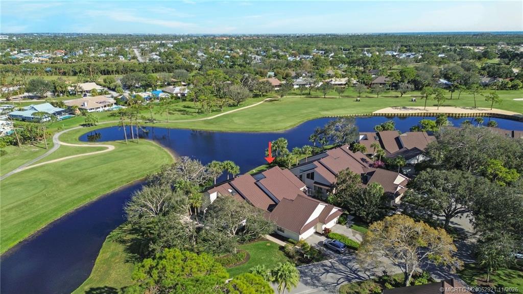 5011 Southeast Brandywine Way Stuart, FL 34997 - Photo 19 of 19 an aerial view of a city