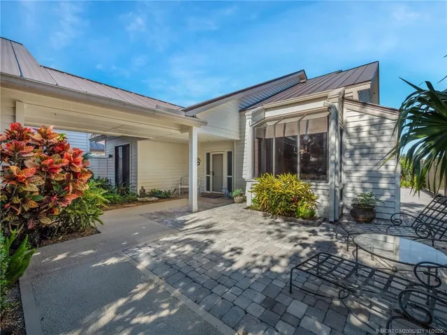 a view of a house with a porch