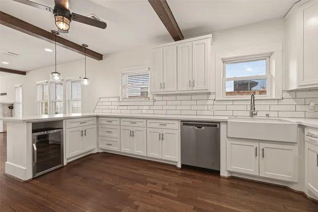 a bed room with a bed and a large window