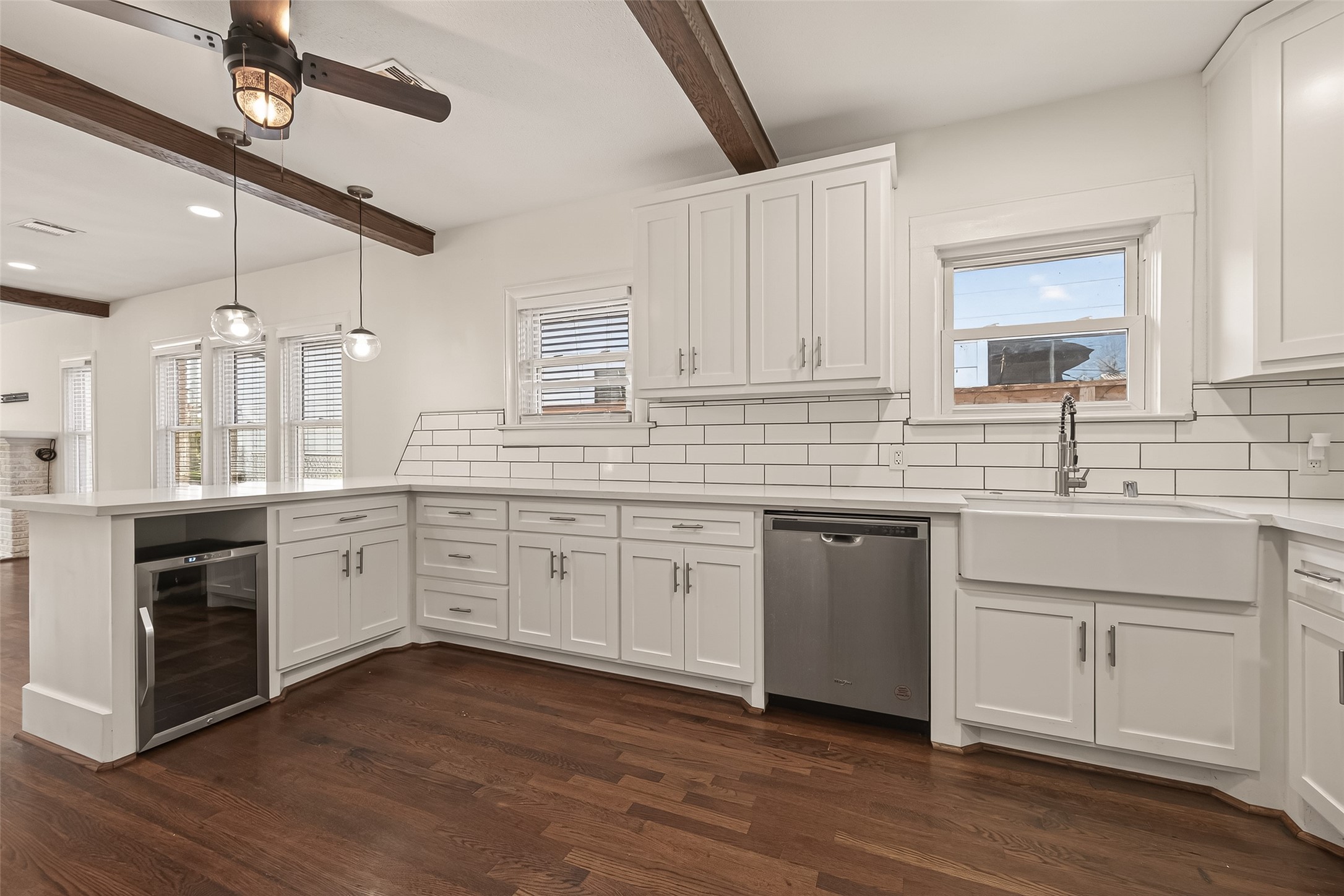 2417 Ruth Street Houston, TX 77004 - Photo 11 of 33 a kitchen with a sink cabinets stainless steel appliances and a window