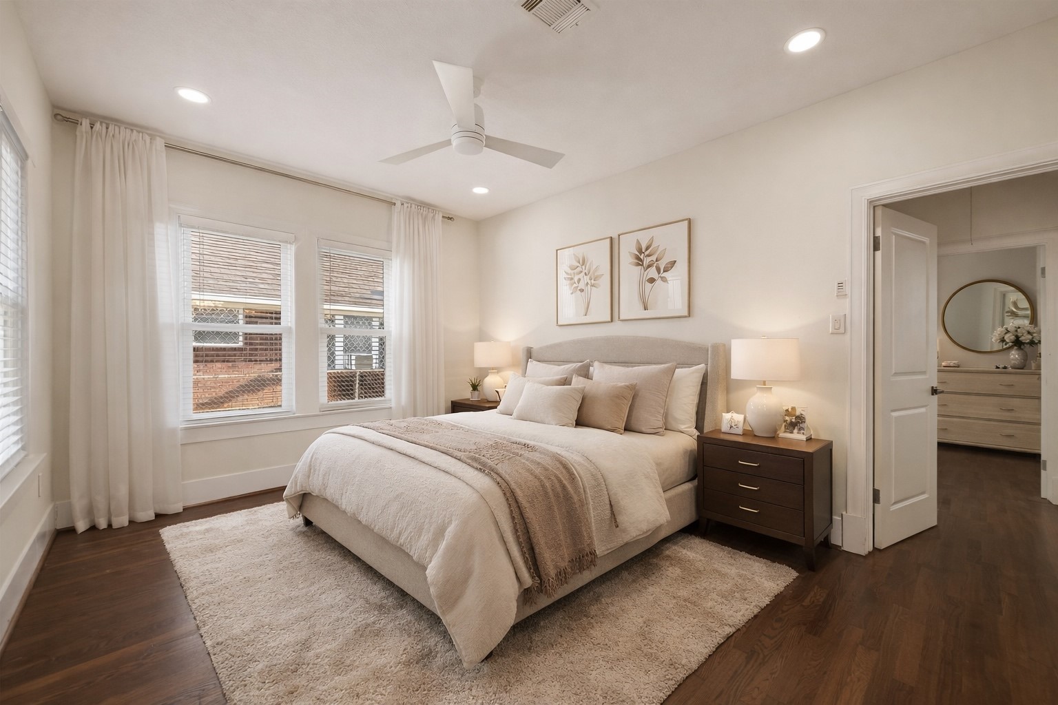 2417 Ruth Street Houston, TX 77004 - Photo 15 of 33 a spacious bedroom with a large bed and a window