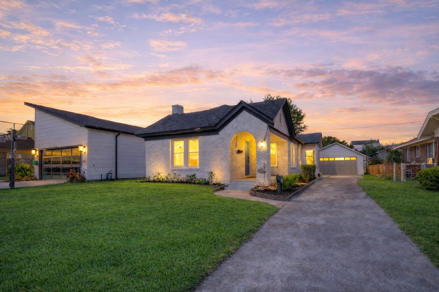 2417 Ruth Street Houston, TX 77004 - Photo 2 of 33 a view of a big house with a big yard and a large tree