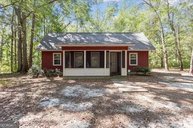 a house with a tree in front of it