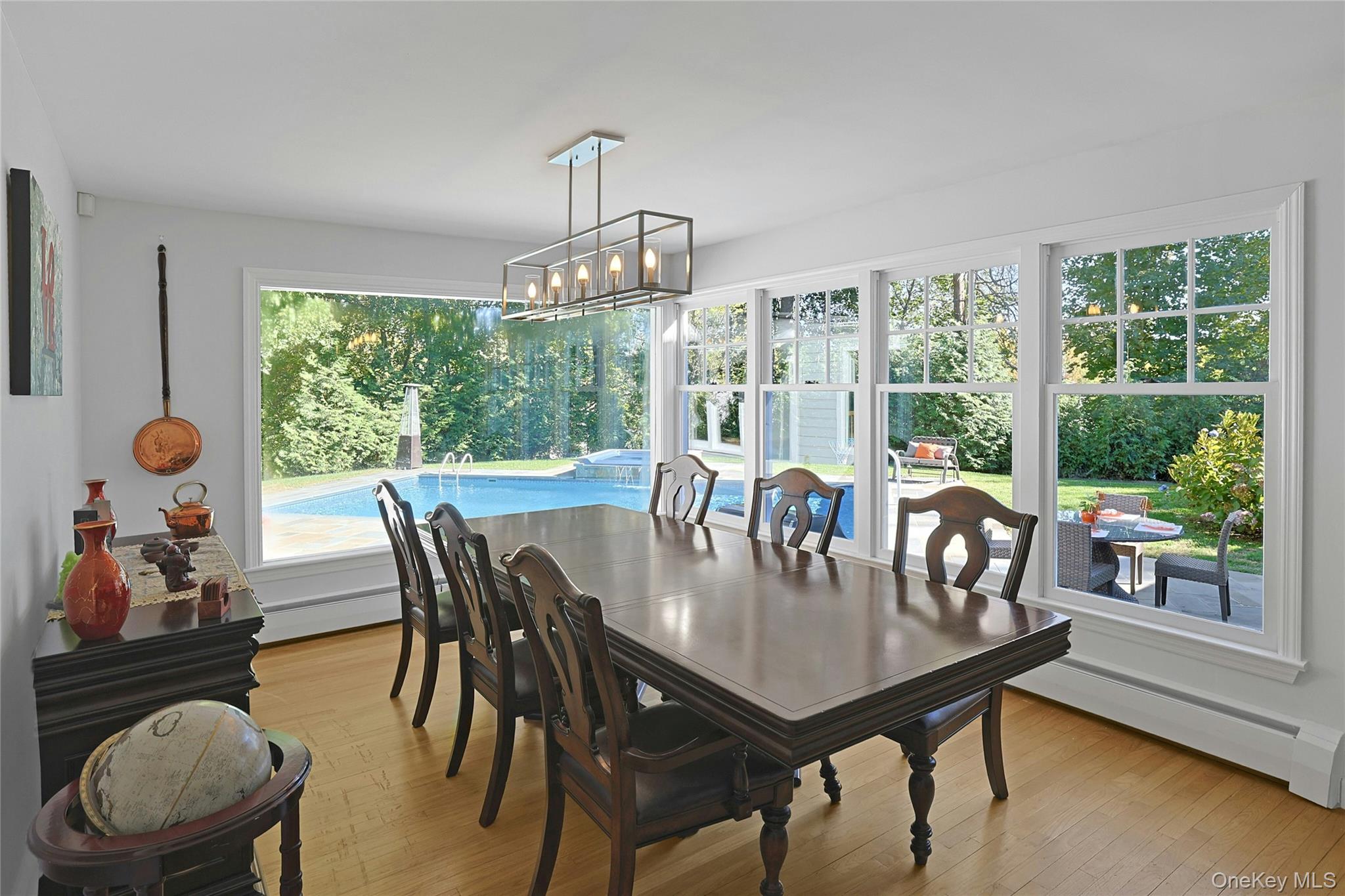8 Creemer Road Armonk, NY 10504 - Photo 10 of 38 a view of a dining room with furniture window and outside view