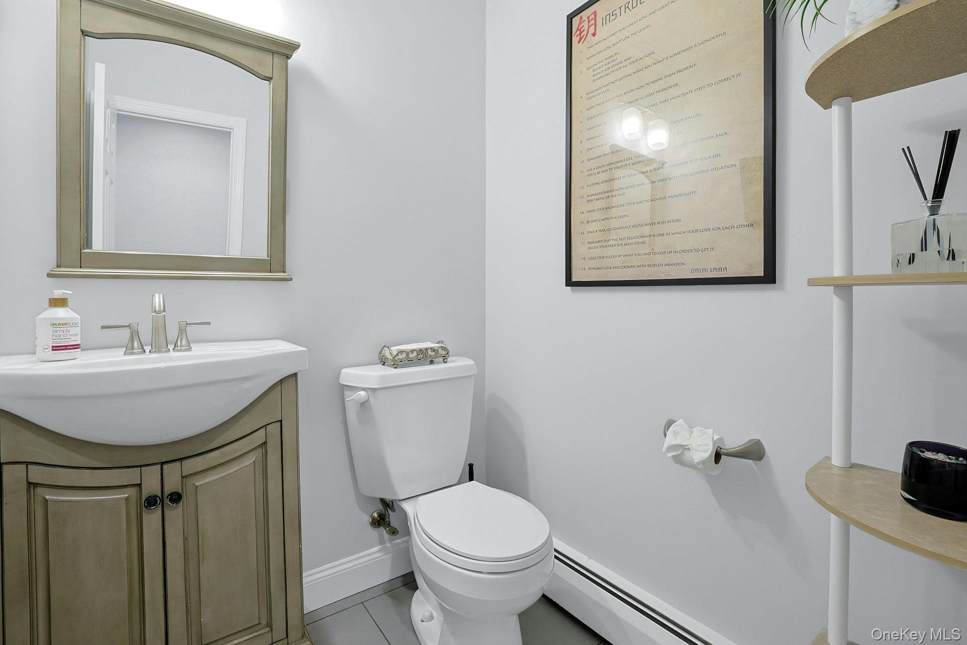 8 Creemer Road Armonk, NY 10504 - Photo 13 of 38 a bathroom with a toilet sink and mirror