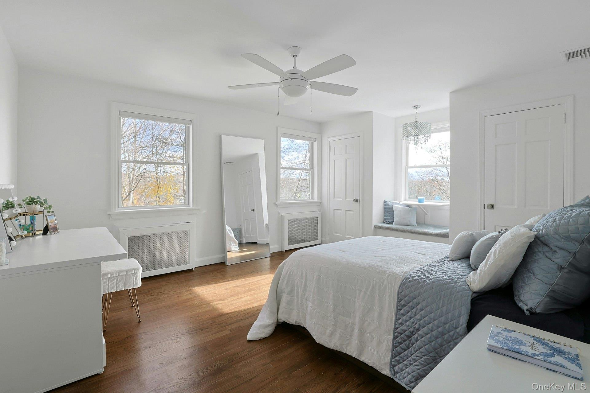 8 Creemer Road Armonk, NY 10504 - Photo 21 of 38 a bedroom with a bed and window