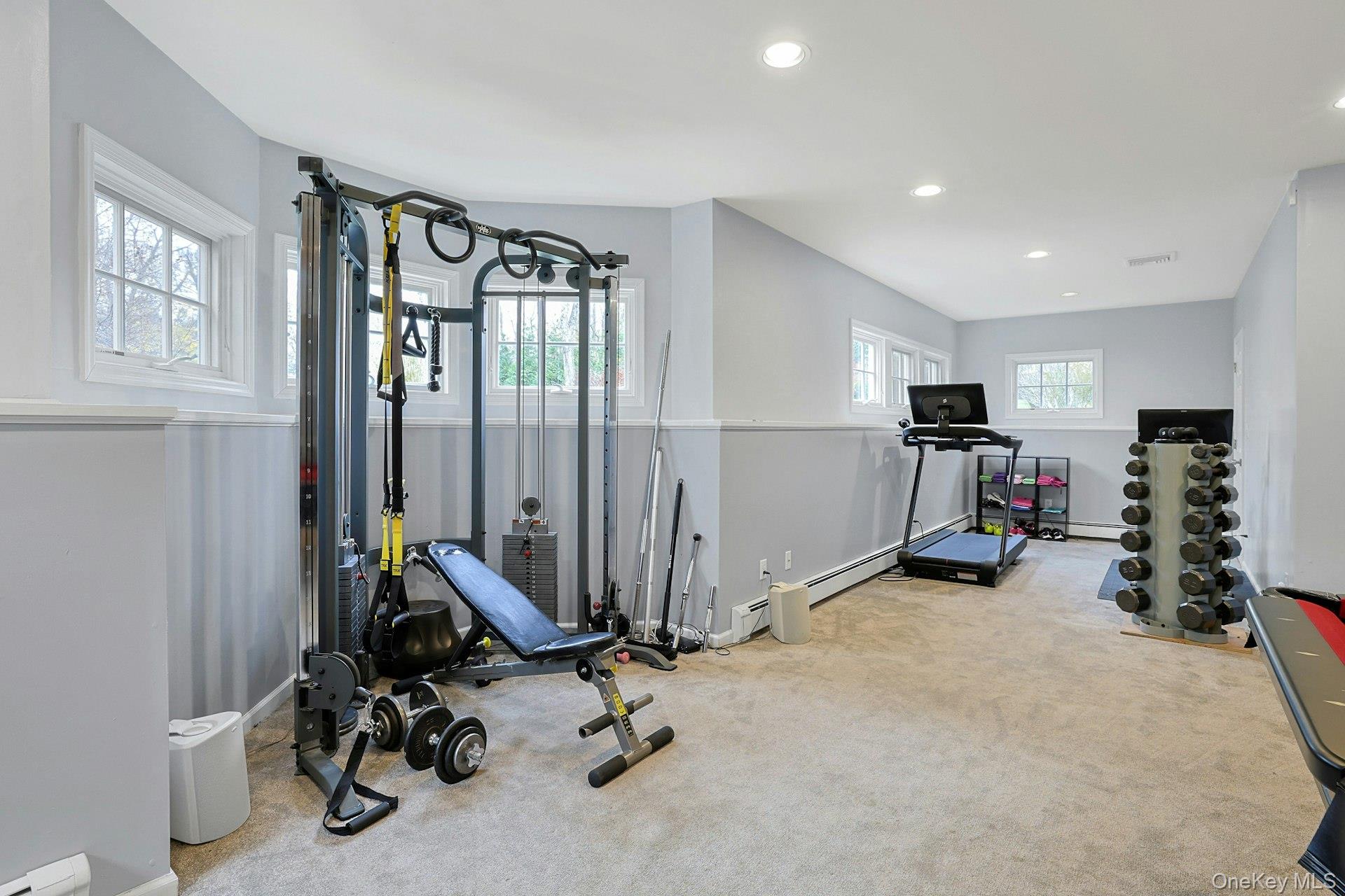 8 Creemer Road Armonk, NY 10504 - Photo 24 of 38 a view of a room with gym equipment