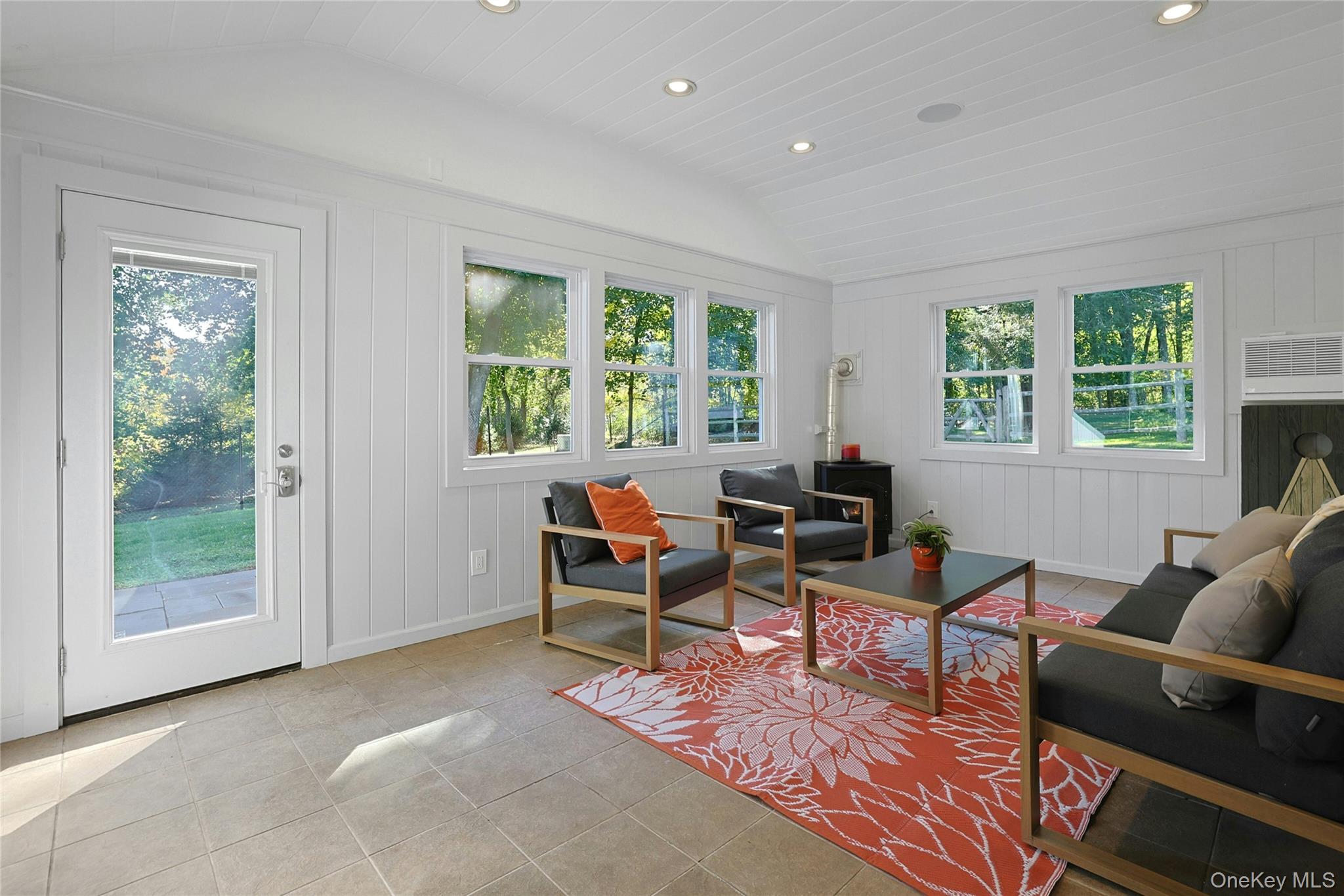 8 Creemer Road Armonk, NY 10504 - Photo 27 of 38 a living room with furniture and a window