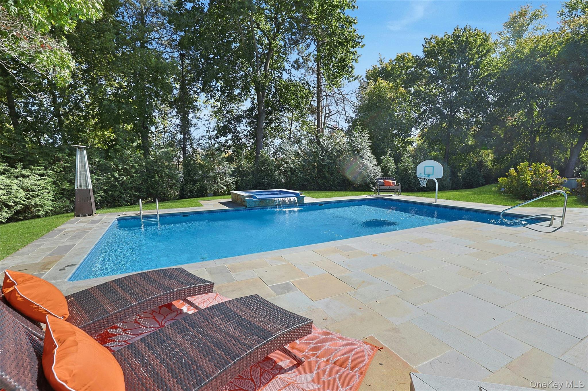 8 Creemer Road Armonk, NY 10504 - Photo 32 of 38 a view of an outdoor space with swimming pool