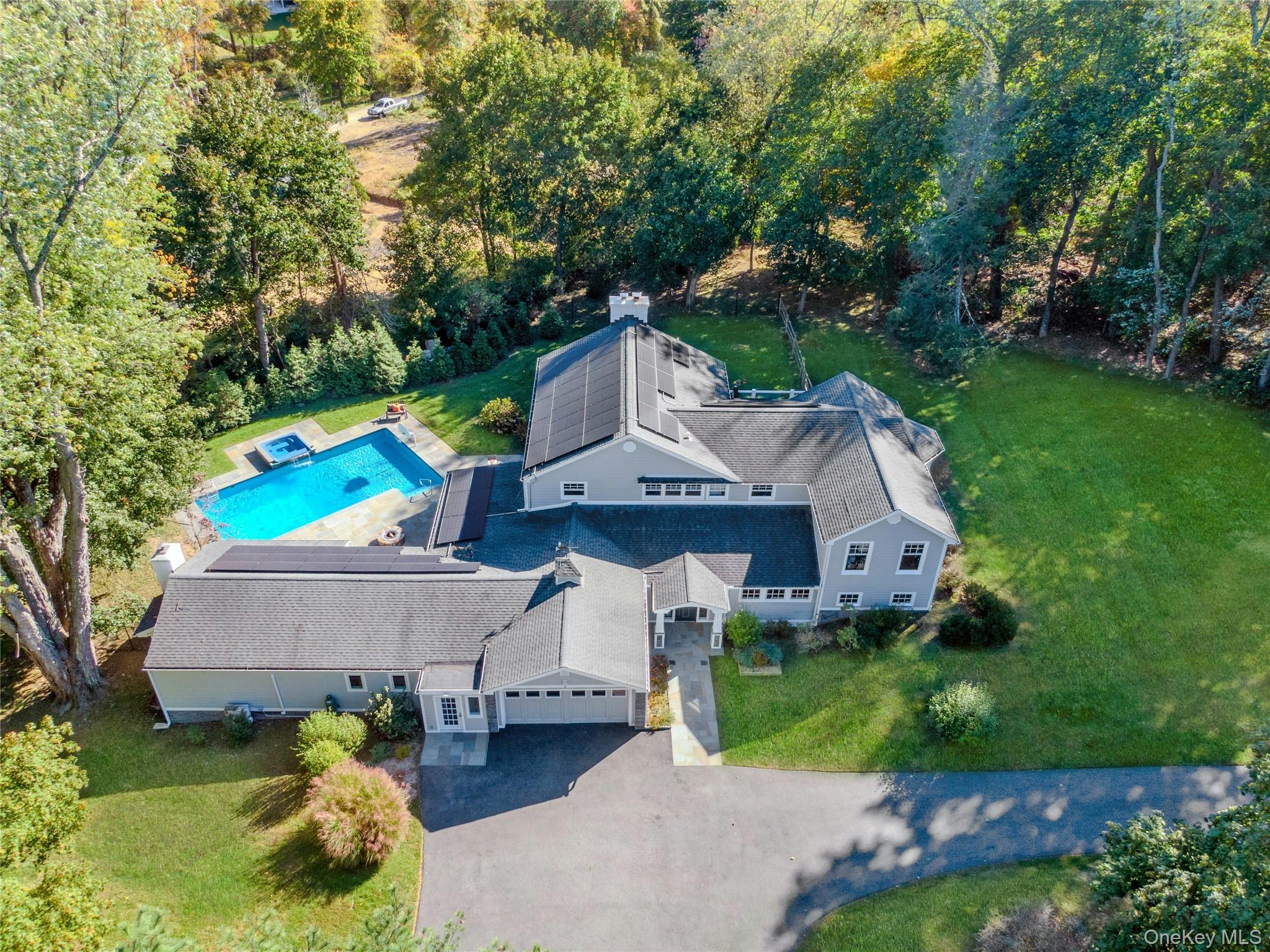 8 Creemer Road Armonk, NY 10504 - Photo 33 of 38 an aerial view of a house