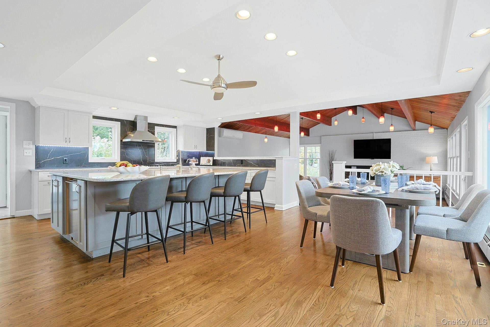 8 Creemer Road Armonk, NY 10504 - Photo 4 of 38 a view of a dining room with furniture wooden floor and chandelier