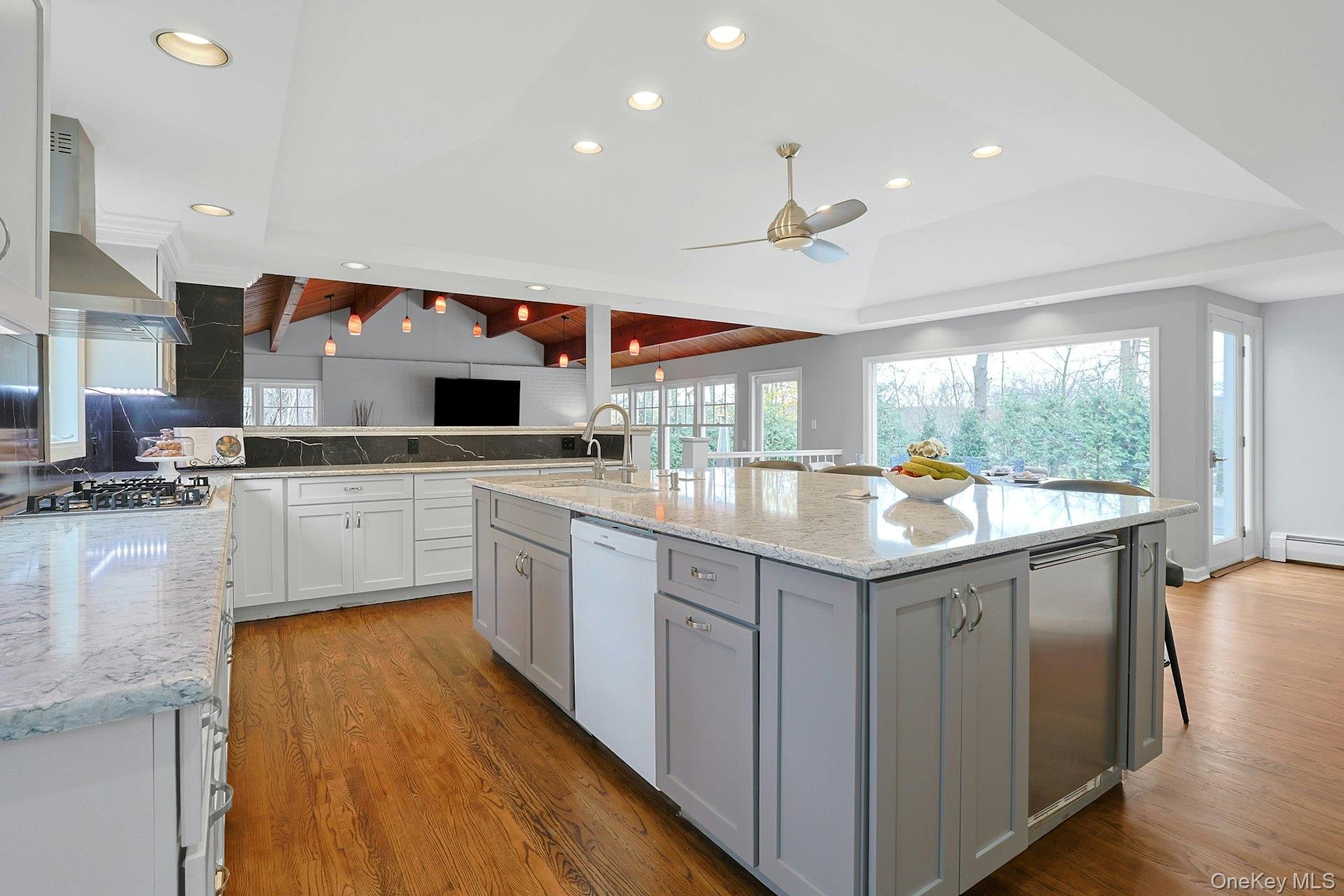 8 Creemer Road Armonk, NY 10504 - Photo 5 of 38 a kitchen with stainless steel appliances granite countertop sink stove and refrigerator